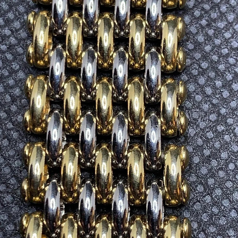 3/$27  Fashion watch with subtle two tone band